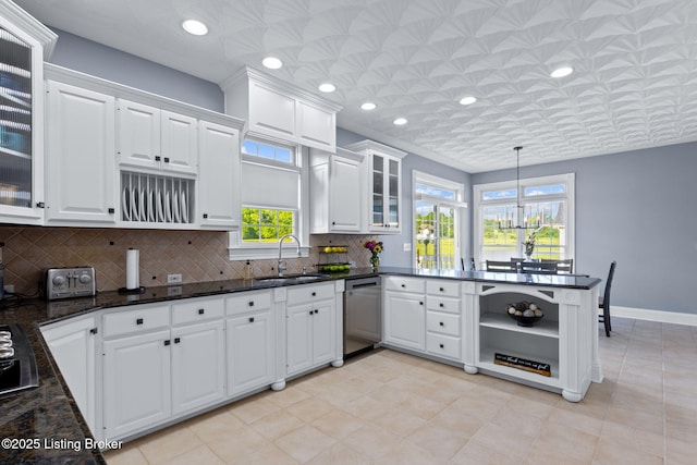 kitchen featuring a sink, open shelves, dishwasher, white cabinets, and recessed lighting
