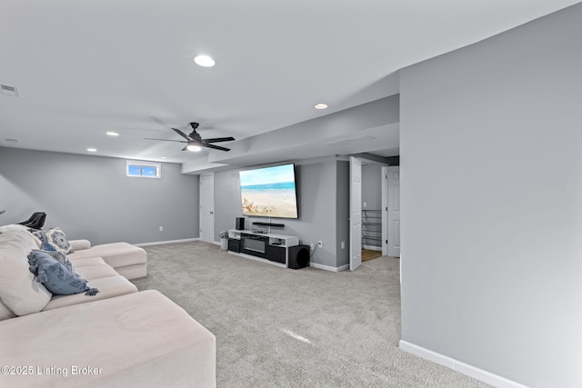 carpeted living room with baseboards, recessed lighting, and a ceiling fan