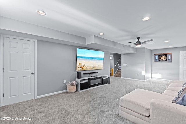 carpeted living room with stairway, recessed lighting, baseboards, and a ceiling fan