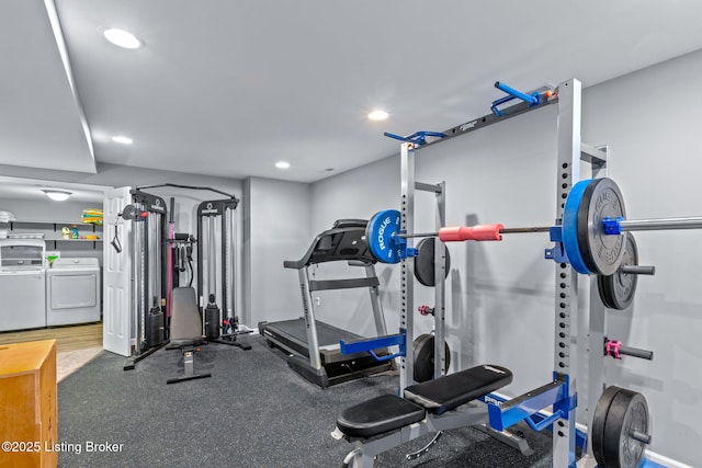 exercise room with recessed lighting and washing machine and clothes dryer