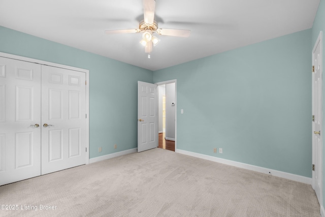 10304 Spring Meyer Rd, Louisville, KY 40223 - unfurnished bedroom featuring carpet flooring, a closet, baseboards, and ceiling fan
