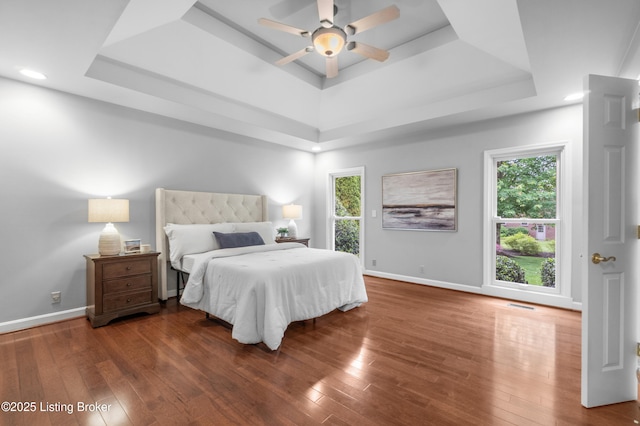 10304 Spring Meyer Rd, Louisville, KY 40223 - bedroom featuring a tray ceiling, wood finished floors, baseboards, and recessed lighting