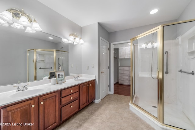 10304 Spring Meyer Rd, Louisville, KY 40223 - full bath featuring double vanity, a stall shower, recessed lighting, a closet, and tile patterned floors