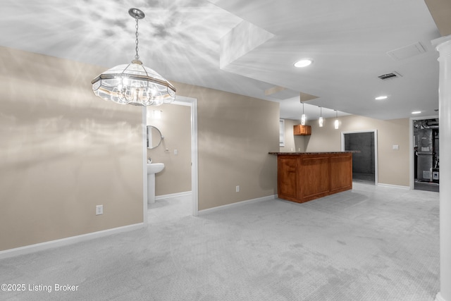10304 Spring Meyer Rd, Louisville, KY 40223 - unfurnished living room featuring light carpet, baseboards, a dry bar, recessed lighting, and a chandelier