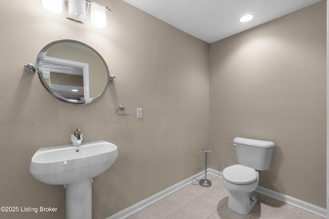 10304 Spring Meyer Rd, Louisville, KY 40223 - half bath featuring tile patterned flooring, toilet, and baseboards
