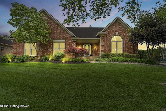10304 Spring Meyer Rd, Louisville, KY 40223 - view of front of property featuring brick siding and a front lawn