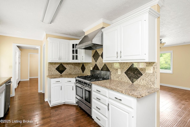 198 Mill Creek Ln, Bardstown, KY 40004 - kitchen with stainless steel appliances, wall chimney range hood, dark wood-style floors, white cabinetry, and tasteful backsplash