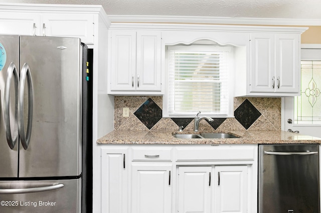198 Mill Creek Ln, Bardstown, KY 40004 - kitchen featuring stainless steel appliances, a sink, tasteful backsplash, white cabinetry, and light stone countertops