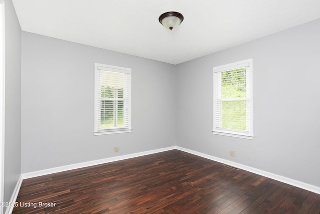 198 Mill Creek Ln, Bardstown, KY 40004 - spare room featuring healthy amount of natural light, dark wood finished floors, and baseboards