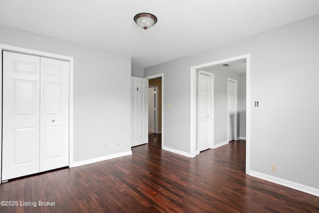 198 Mill Creek Ln, Bardstown, KY 40004 - unfurnished bedroom with hardwood / wood-style floors, a closet, and baseboards
