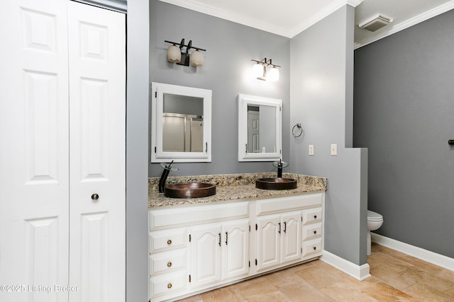 198 Mill Creek Ln, Bardstown, KY 40004 - full bath with crown molding, a closet, double vanity, toilet, and baseboards