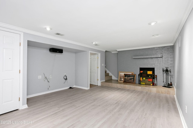 198 Mill Creek Ln, Bardstown, KY 40004 - finished below grade area with a brick fireplace, wood finished floors, stairs, baseboards, and ornamental molding