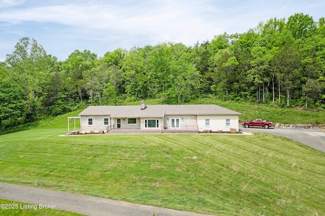 198 Mill Creek Ln, Bardstown, KY 40004 - ranch-style home featuring a front yard, a wooded view, and a deck