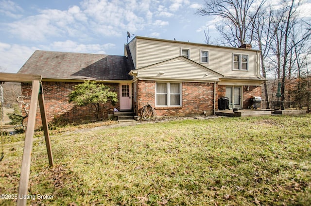 562 Peaceful Way, Shepherdsville, KY 40165 - rear view of house featuring a chimney, brick siding, and a lawn