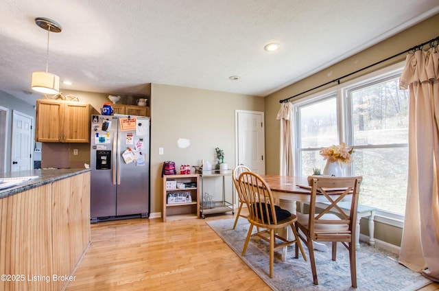 562 Peaceful Way, Shepherdsville, KY 40165 - dining space featuring light wood-style flooring, healthy amount of natural light, a textured ceiling, recessed lighting, and baseboards
