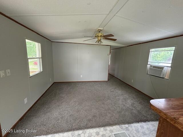 345 Hemlock Dr, Shepherdsville, KY 40165 - empty room featuring lofted ceiling, cooling unit, a ceiling fan, and carpet flooring