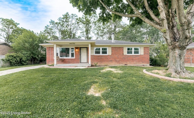 3009 Huberta Dr, Louisville, KY 40216 - single story home featuring brick siding, a front lawn, and driveway