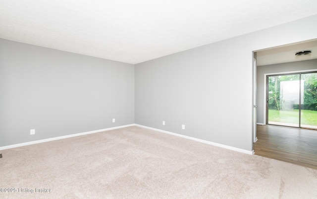 3009 Huberta Dr, Louisville, KY 40216 - empty room with carpet flooring and baseboards