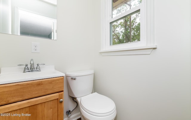 3009 Huberta Dr, Louisville, KY 40216 - bathroom with toilet and vanity