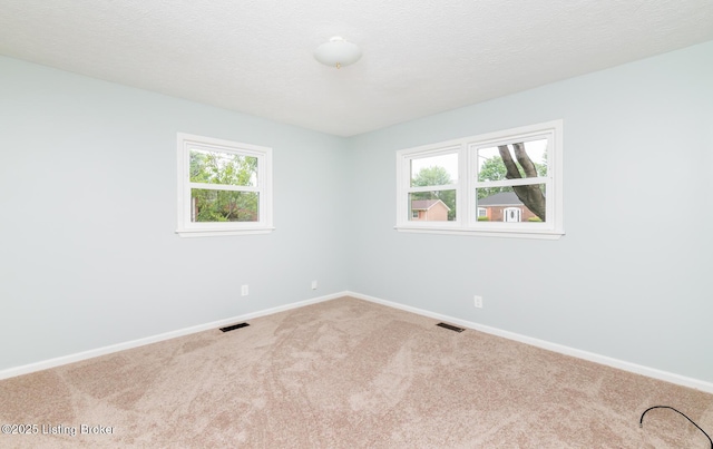 3009 Huberta Dr, Louisville, KY 40216 - carpeted spare room featuring baseboards