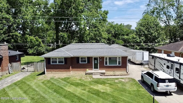 4919 Ferrer Way, Louisville, KY 40291 - view of front of home featuring brick siding, a shingled roof, and driveway