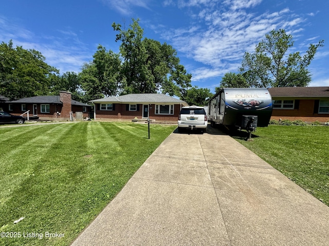 4919 Ferrer Way, Louisville, KY 40291 - ranch-style house with driveway, a front lawn, and brick siding
