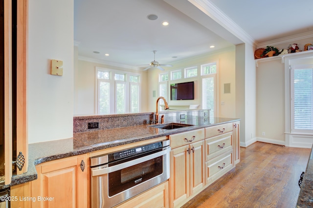 5302 Olde Creek Way, Prospect, KY 40059 - kitchen with a sink, ornamental molding, light wood-type flooring, plenty of natural light, and recessed lighting