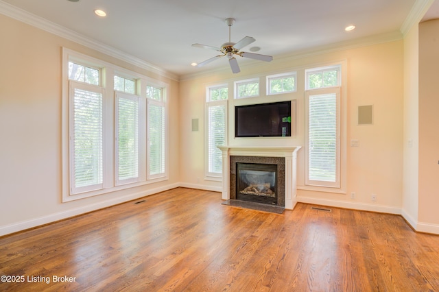 5302 Olde Creek Way, Prospect, KY 40059 - unfurnished living room with wood finished floors, a ceiling fan, baseboards, a glass covered fireplace, and ornamental molding