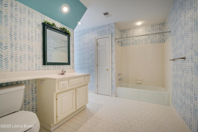 5302 Olde Creek Way, Prospect, KY 40059 - bathroom with wallpapered walls, toilet, vanity, bathing tub / shower combination, and tile patterned floors