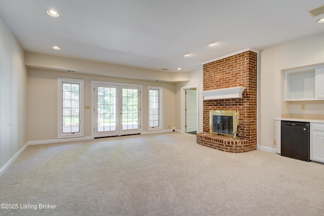 5302 Olde Creek Way, Prospect, KY 40059 - unfurnished living room featuring light colored carpet, baseboards, a fireplace, plenty of natural light, and recessed lighting