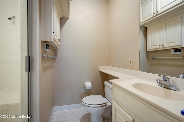 5302 Olde Creek Way, Prospect, KY 40059 - bathroom featuring tile patterned floors, toilet, baseboards, vanity, and a shower