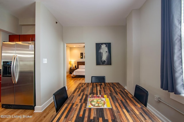 604 S 3rd St Unit 803, Louisville, KY 40202 - dining room featuring wood finished floors and baseboards