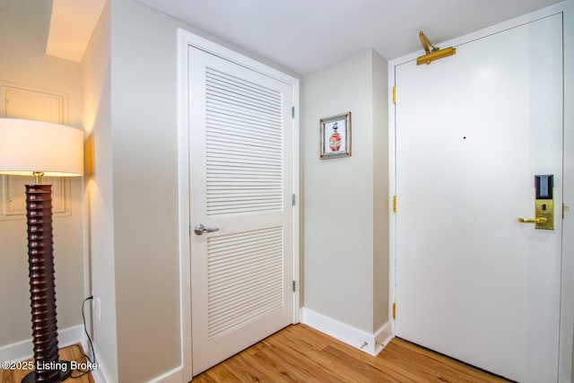 604 S 3rd St Unit 803, Louisville, KY 40202 - corridor with light wood-style floors and baseboards