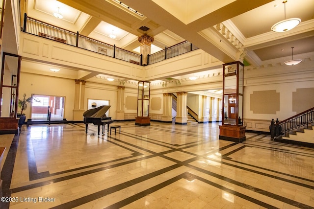 604 S 3rd St Unit 803, Louisville, KY 40202 - lobby featuring a towering ceiling, stairs, crown molding, coffered ceiling, and beam ceiling