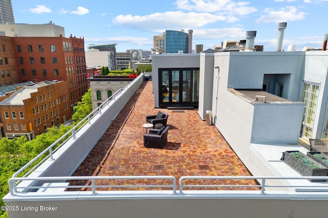 711 W Main St Unit T, Louisville, KY 40202 - view of patio featuring a view of city and a balcony
