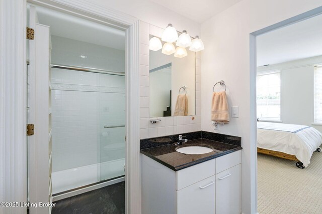 711 W Main St Unit T, Louisville, KY 40202 - ensuite bathroom with a shower stall, vanity, and toilet