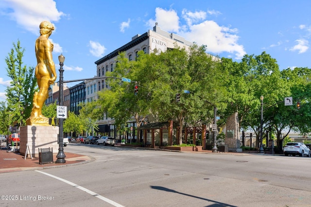 711 W Main St Unit T, Louisville, KY 40202 - view of asphalt road with street lights, curbs, sidewalks, and traffic signs