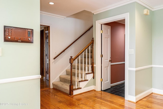 3920 Elfin Ave, Louisville, KY 40207 - stairway with hardwood / wood-style floors, ornamental molding, recessed lighting, and baseboards