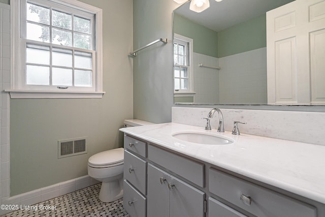 3920 Elfin Ave, Louisville, KY 40207 - bathroom with vanity, toilet, and baseboards
