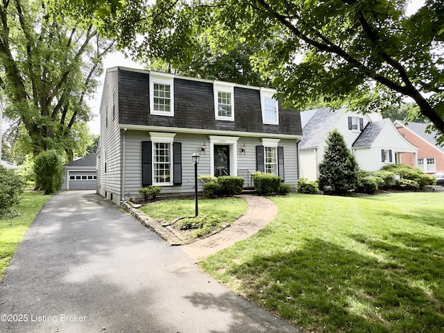 3920 Elfin Ave, Louisville, KY 40207 - view of front of house featuring a shingled roof, a front lawn, and a garage