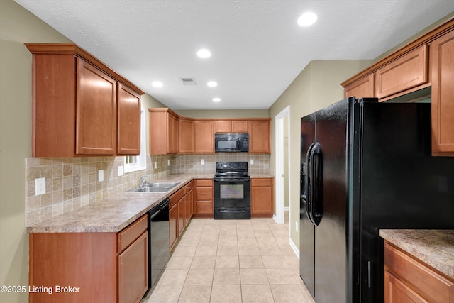 8712 Chetwood Trace Dr, Louisville, KY 40291 - kitchen featuring black appliances, a sink, backsplash, light tile patterned floors, and light countertops