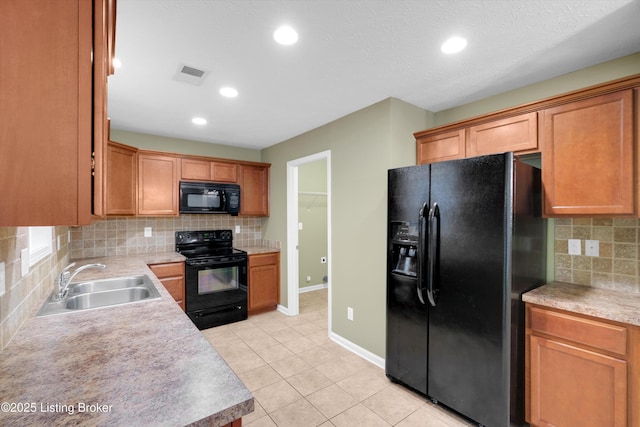 8712 Chetwood Trace Dr, Louisville, KY 40291 - kitchen with black appliances, a sink, decorative backsplash, light tile patterned floors, and recessed lighting