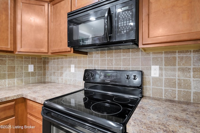 8712 Chetwood Trace Dr, Louisville, KY 40291 - kitchen featuring black appliances, light countertops, tasteful backsplash, and brown cabinets