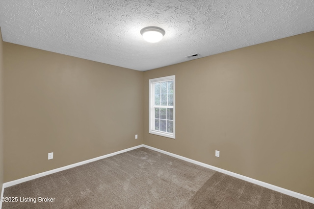 8712 Chetwood Trace Dr, Louisville, KY 40291 - unfurnished room with a textured ceiling, baseboards, and carpet flooring