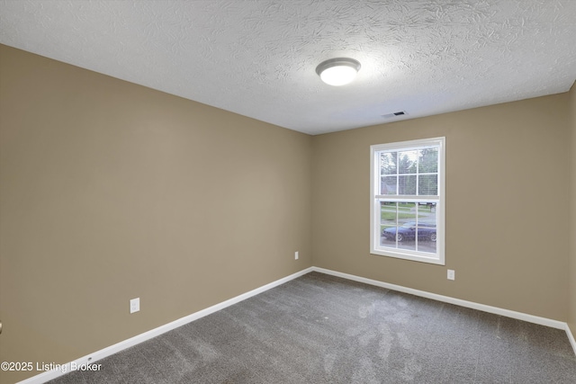 8712 Chetwood Trace Dr, Louisville, KY 40291 - empty room with baseboards, a textured ceiling, and dark colored carpet