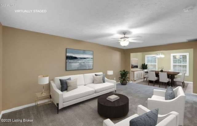 8712 Chetwood Trace Dr, Louisville, KY 40291 - carpeted living area featuring baseboards and a ceiling fan