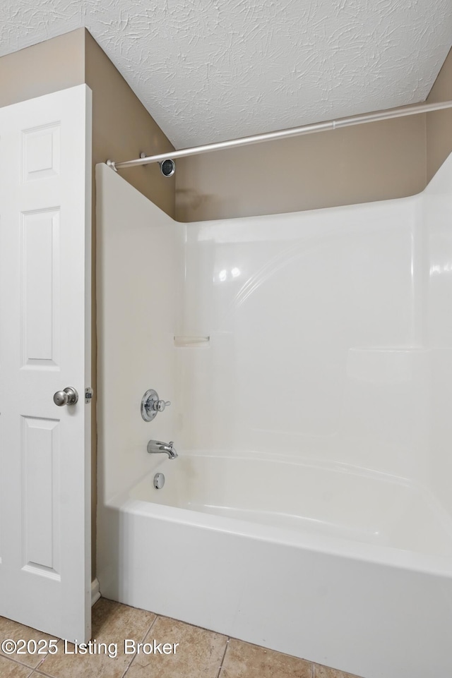 8712 Chetwood Trace Dr, Louisville, KY 40291 - bathroom with tile patterned flooring, shower / bath combination, and a textured ceiling