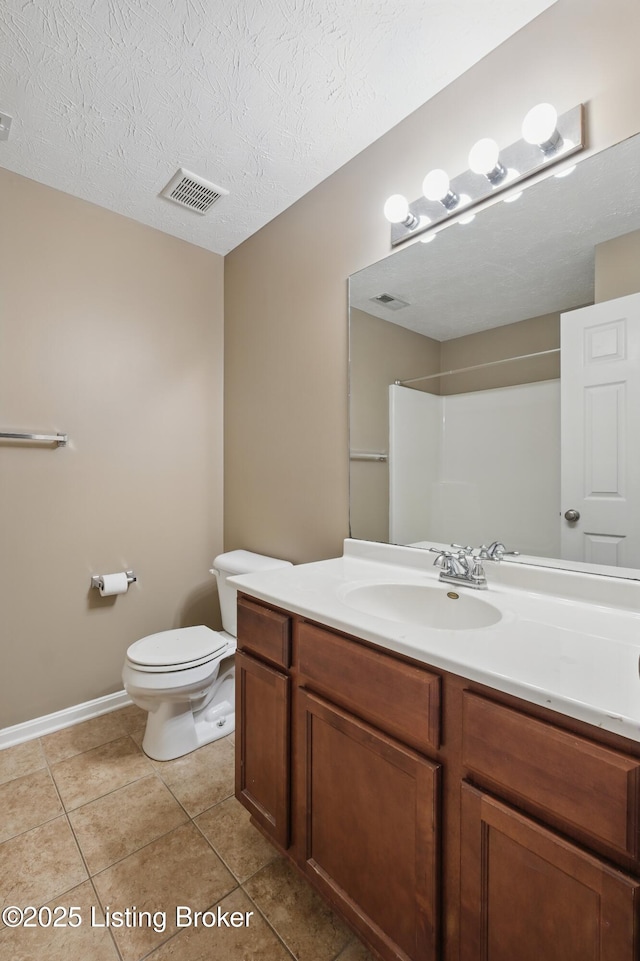 8712 Chetwood Trace Dr, Louisville, KY 40291 - full bath with vanity, toilet, tile patterned floors, a textured ceiling, and baseboards