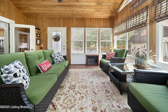 5506 Bamberrie Cross Rd, Louisville, KY 40214 - living area with vaulted ceiling, wood ceiling, wood walls, and wood finished floors