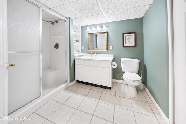 5506 Bamberrie Cross Rd, Louisville, KY 40214 - bathroom featuring a stall shower, tile patterned flooring, vanity, toilet, and baseboards